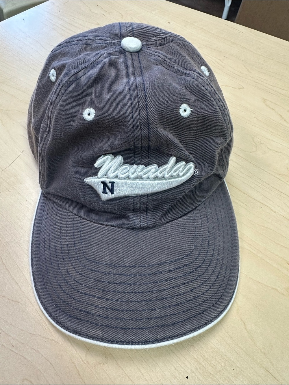 Nevada Script Baseball Cap in Charcoal with White Trim